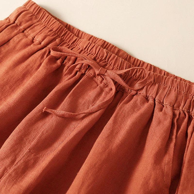 Relaxed Drawstring Shorts with Elegant Lace-Trimmed Hem