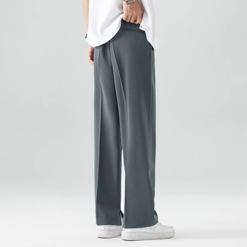 Theodore Relaxed Fit Trousers | Pleated Split Hem Trousers